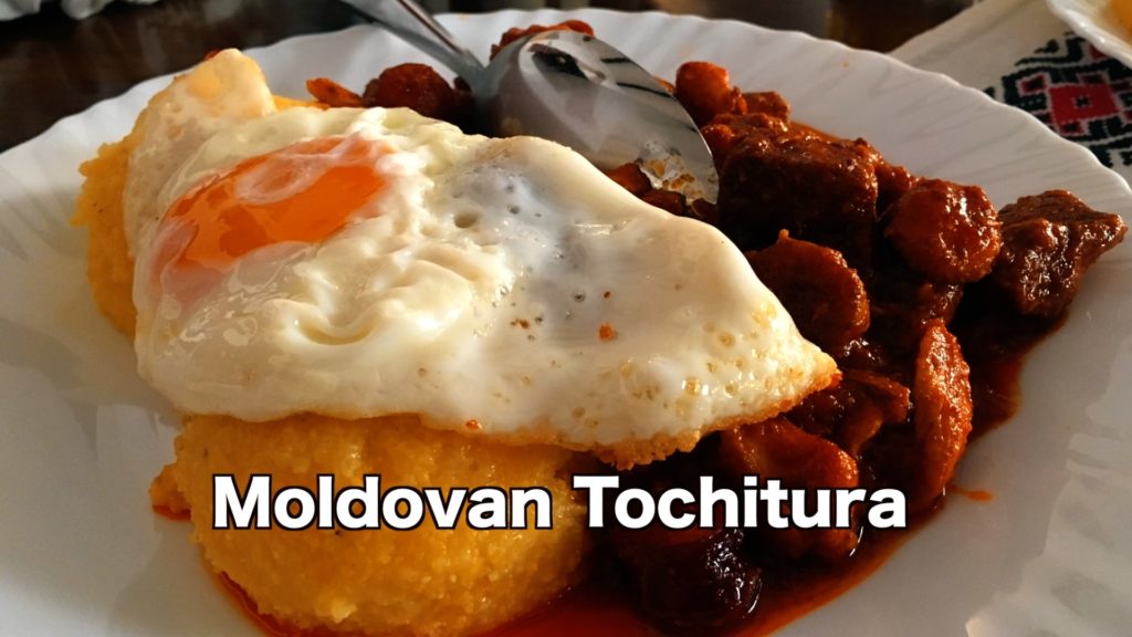 tochitura is a beef and pork stew served with polenta, sheep's cheese, and sometimes a fried egg