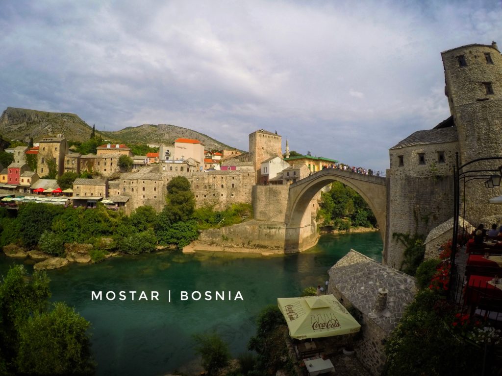 Grab a seat at a cafe along the Neretva river for beautiful views! And if you're lucky, you can watch the Mostar bridge jumpers from your table