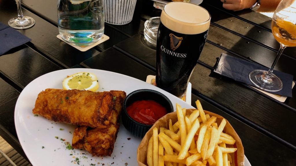 Fish and chips with a cold Guinness from the Irish Pub