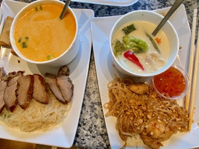 Sai Nam dinner plates including shrimp pad thai