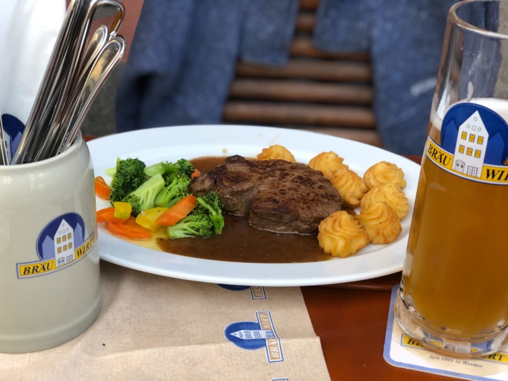 Steak, vegetables, and potatoes at Bräu Wirt