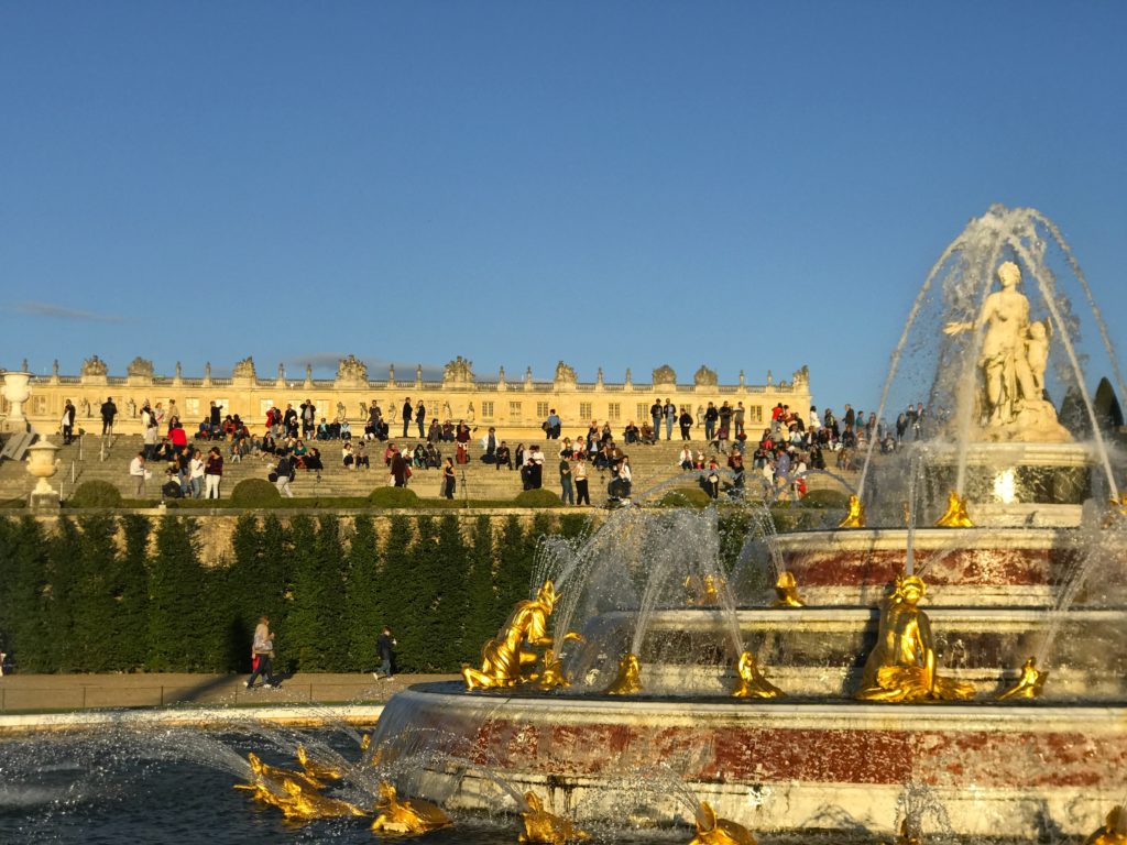 Gold platted fountains in the garden of versailles in France