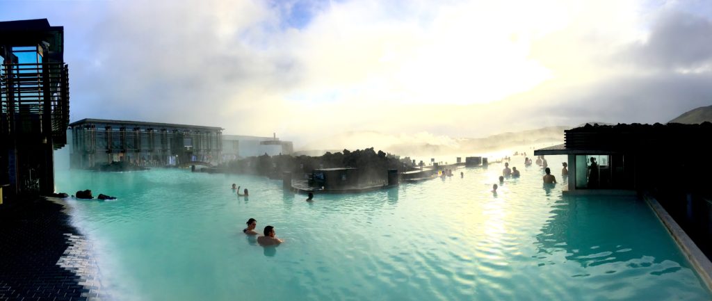 Walking into the thermal pool of the blue lagoon in iceland