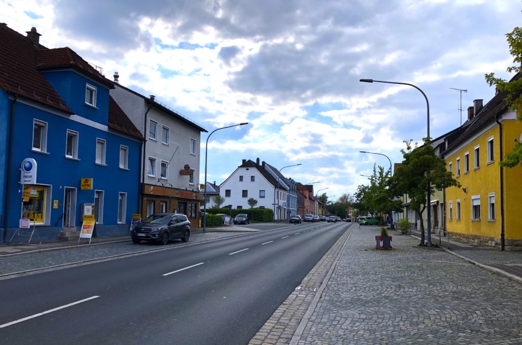 Grafenwoehr's main street through the city with colorful buildings