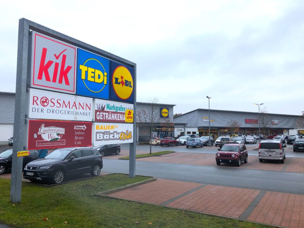 Various business signs in the Grafenwoehr shopping center