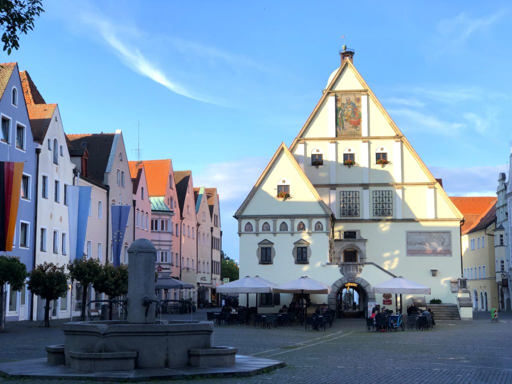 Old city hall, fountains, and colorful buildings in downtown Weiden Germany