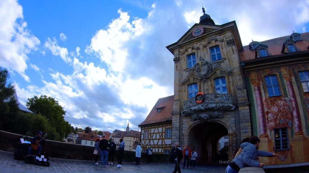 One of the most popular things to do in Bamberg, people watching on the old rathaus bridge